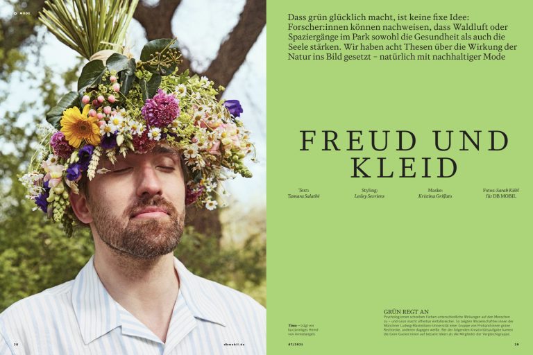 Magazindoppelseite „Freud und Kleid“: Mann mit Blumenkranz im Haar, daneben Text auf grünem Grund